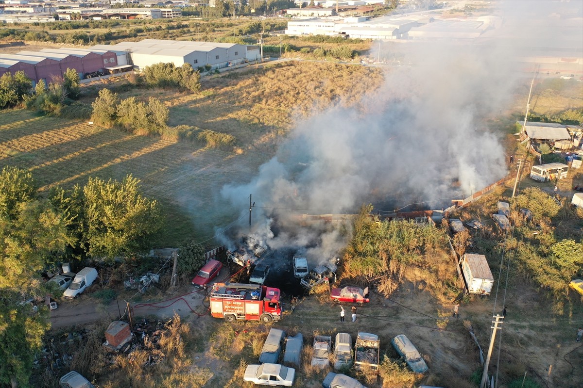 Aydın'ın Efeler ilçesinde yediemin otoparkında çıkan yangın itfaiye ekiplerince...