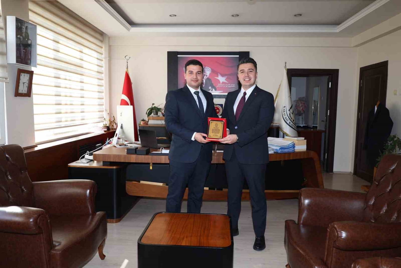 AYDIN'IN KARACASU İLÇESİNDE GÖREV YERLERİ DEĞİŞEN CUMHURİYET SAVCISI ALİ OSMAN TAN İLE MAL MÜDÜRÜ...